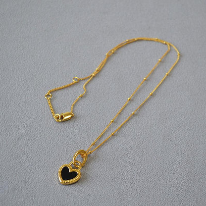 Gold Heart Necklace in Black and White Jula Jewelry