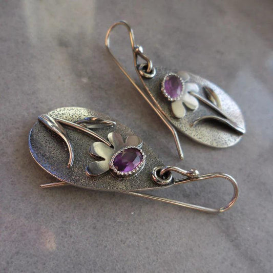 Vintage earrings featuring 3D floral designs Jula Jewelry