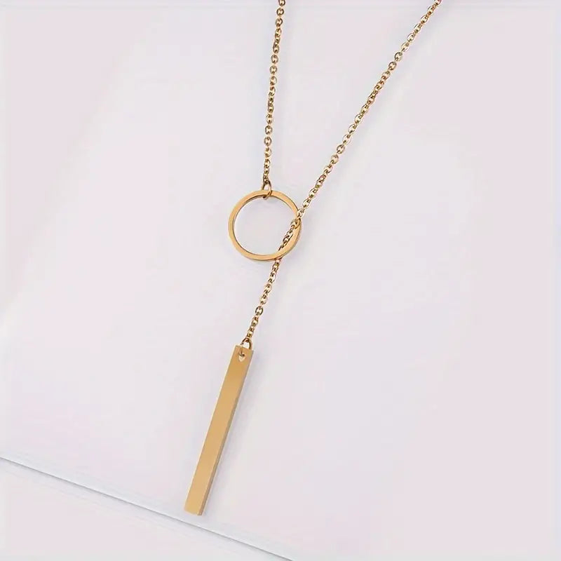 Ethnically inspired alloy circle and bar pendant necklace Jula Jewelry