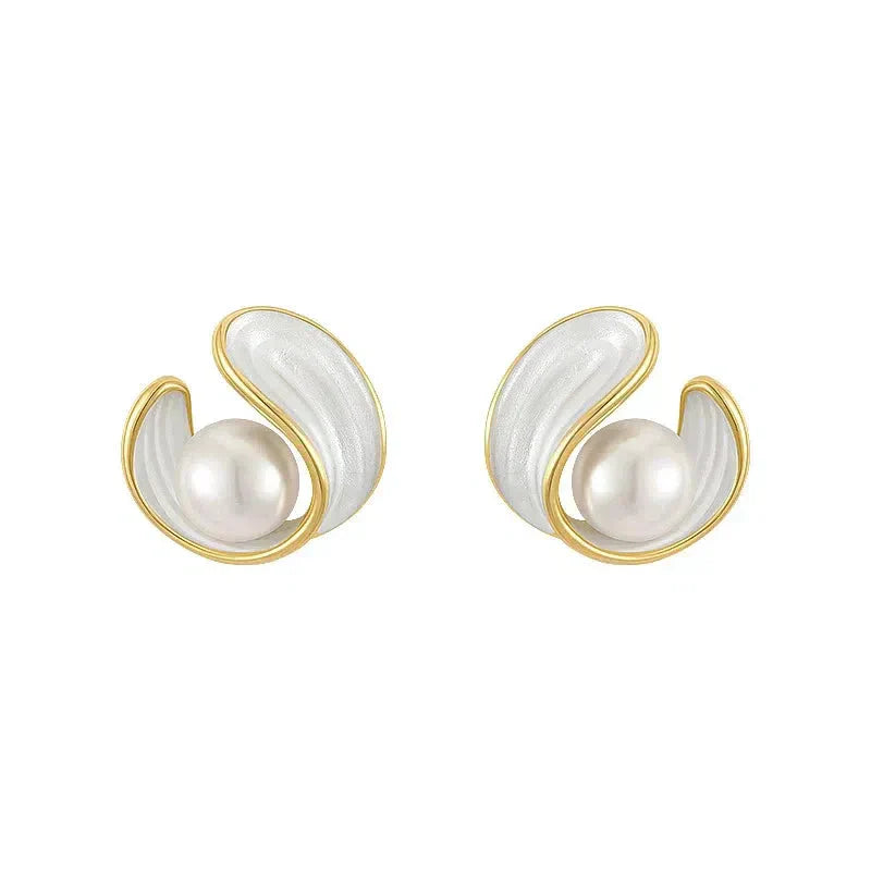 Luxurious earrings featuring white opal and pearl set in gold Jula Jewelry