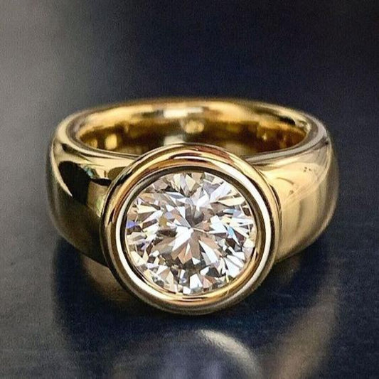 Forged gold ring with vintage zirconias. Jula Jewelry