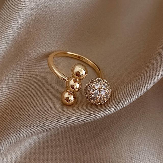 Triple Ball Ring crafted from Gold and Cubic Zirconia Jula Jewelry