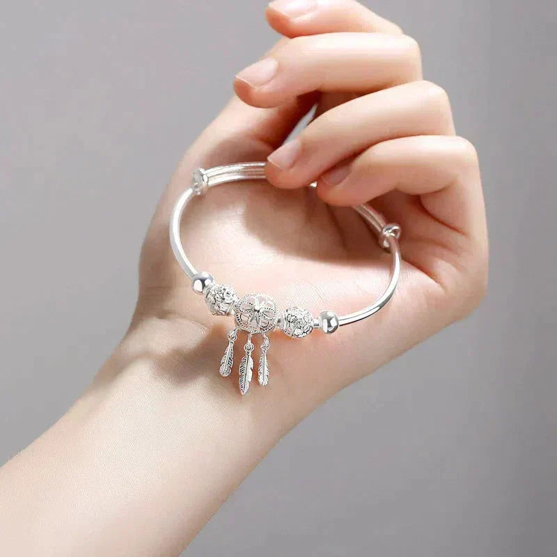 Adjustable bracelet with three leaf charms made of 925 sterling silver Jula Jewelry