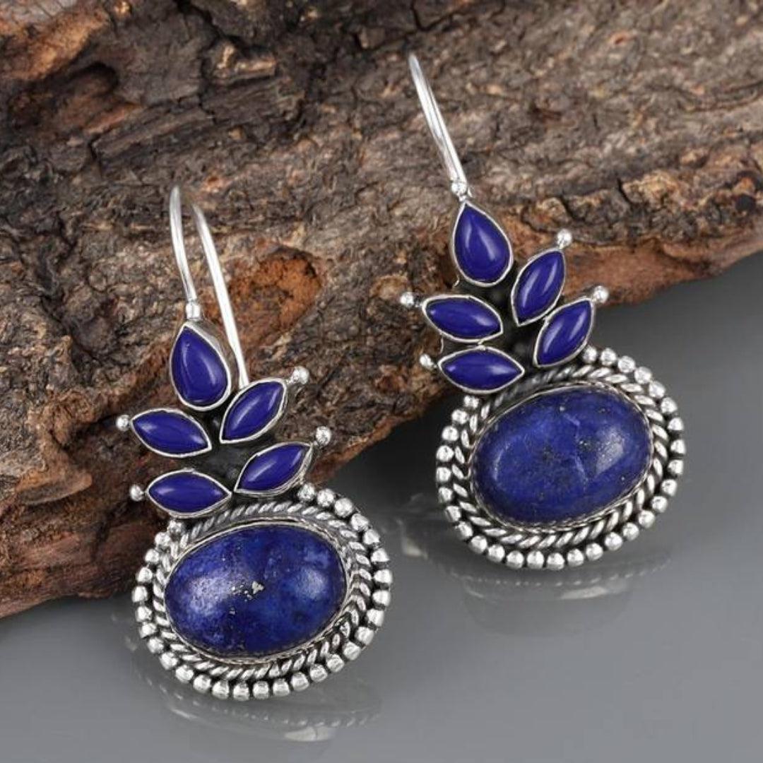 Bohemian earrings featuring blue opal and sterling silver floral accents Jula Jewelry