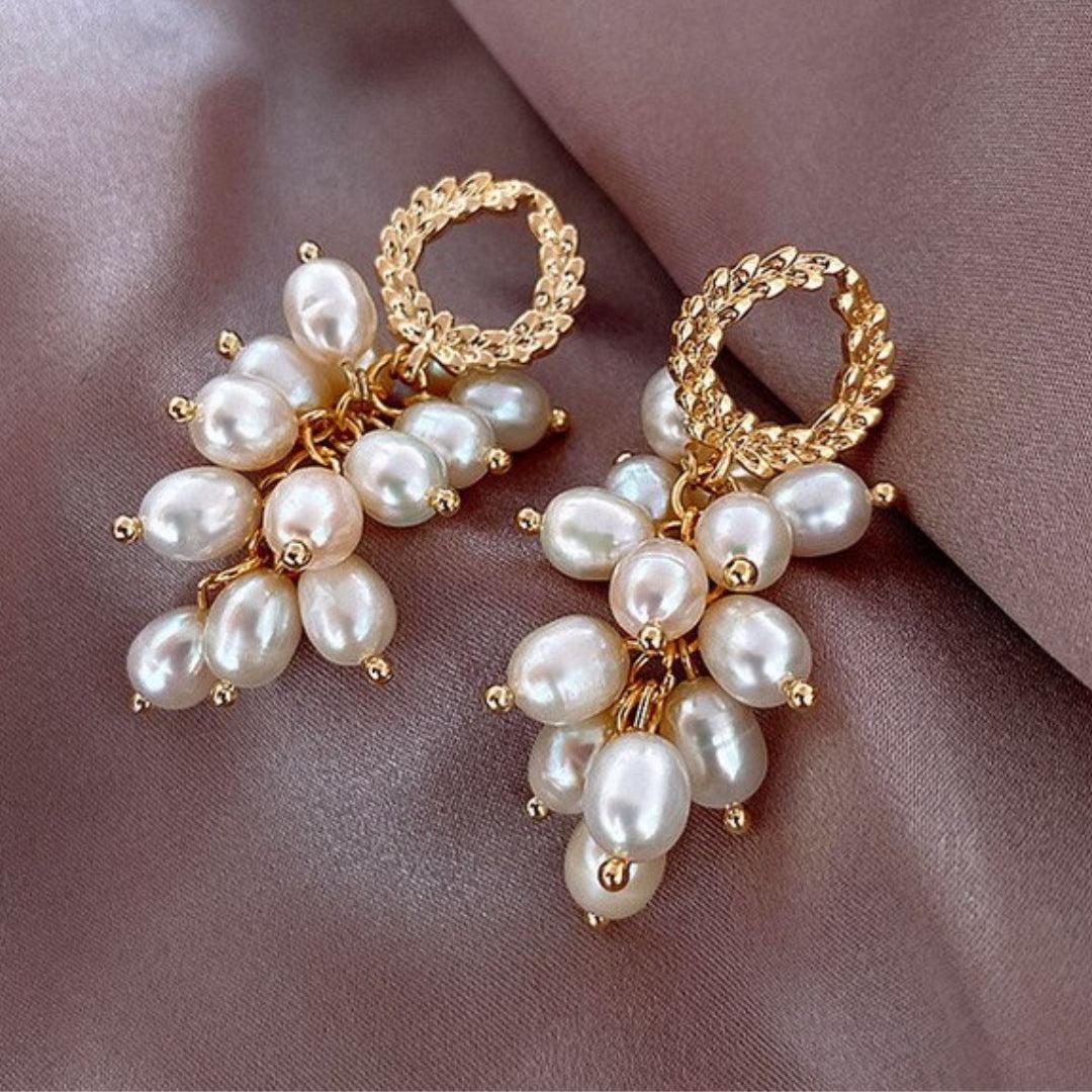 Luxurious earrings with gold-linked pearls Jula Jewelry