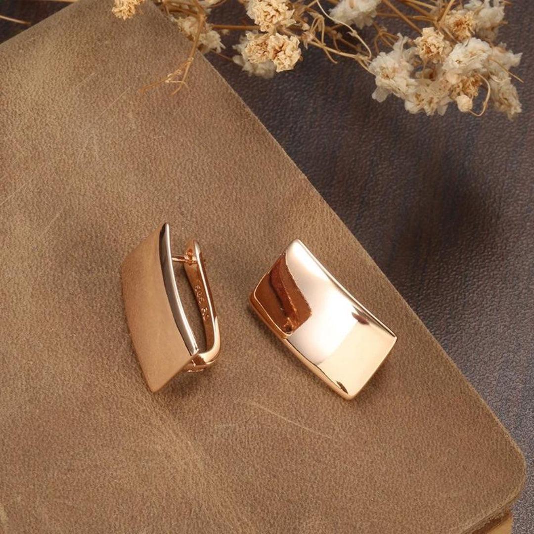 Rose gold ear accessories Jula Jewelry