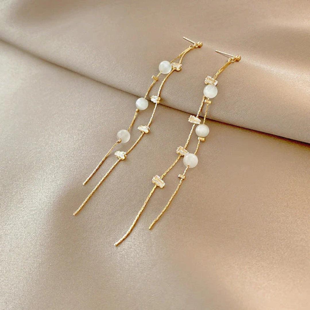 Elegant dangling earrings adorned with pearls and cubic zirconia Jula Jewelry