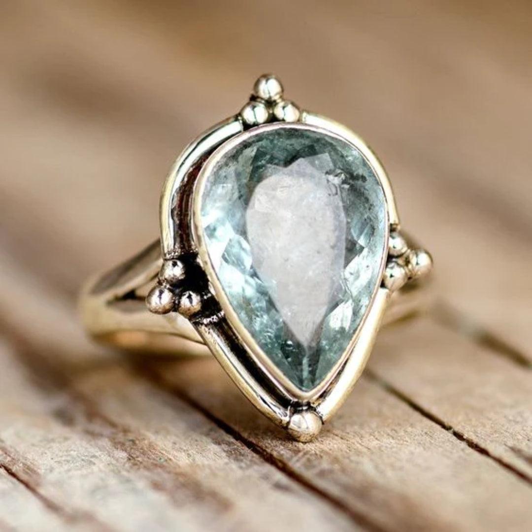 Vintage-style ring featuring a blue crystal inlay Jula Jewelry
