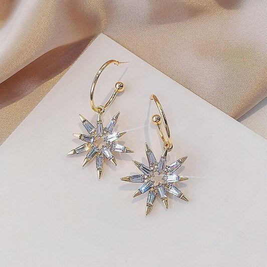 Star Earrings in Gold and Silver Jula Jewelry