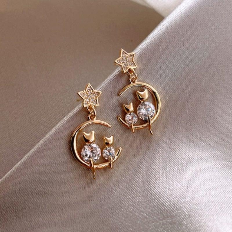Luxurious kitten family crafted from ironite with embedded earrings. Jula Jewelry