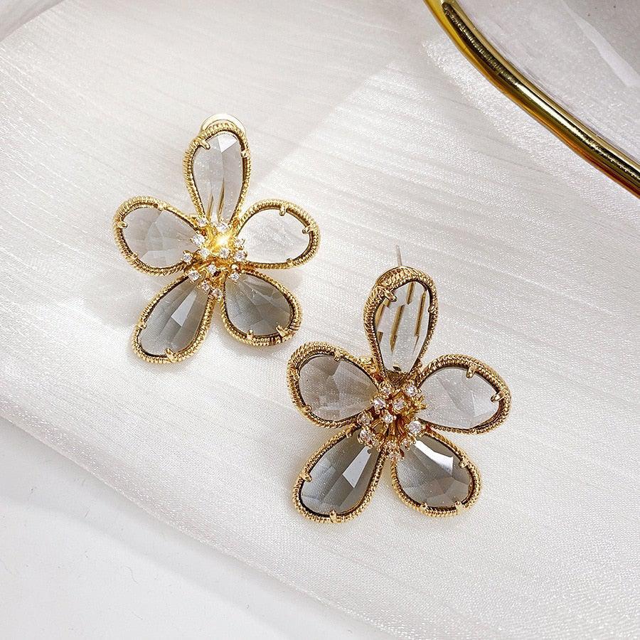 Wealth Blossom with Zirconia-Crusted Twisted Earrings Jula Jewelry
