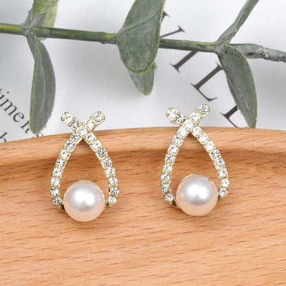 Glittering pearl earrings. Jula Jewelry