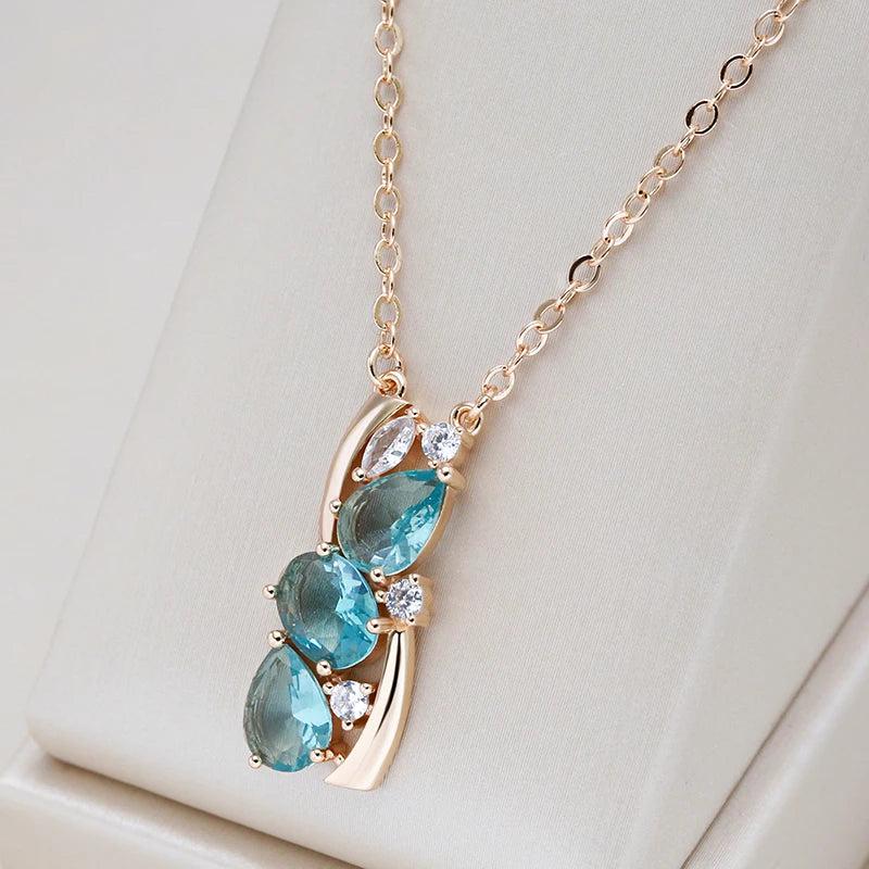 Elegant necklace crafted from blue crystal set in gold. Jula Jewelry