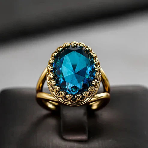 Golden Ring with Blue Sapphire Jula Jewelry