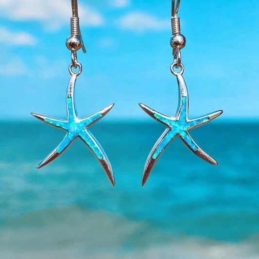 Opal and silver earrings shaped like starfish Jula Jewelry