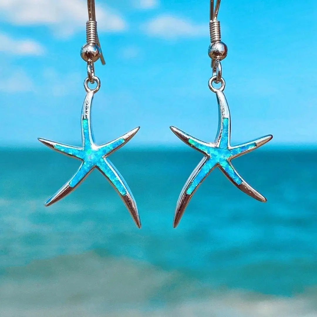 Opal and silver earrings shaped like starfish Jula Jewelry