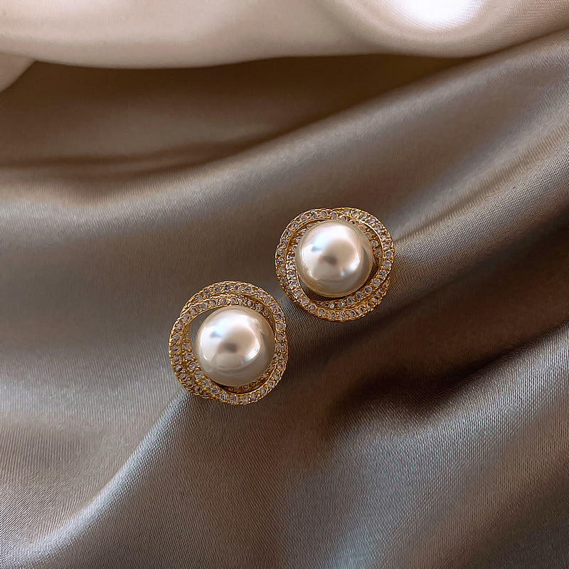 Elegant pearl earrings embellished with diamonds Jula Jewelry