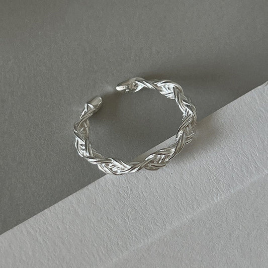 Braided silver band with intricate design Jula Jewelry