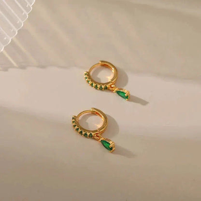 Gold earrings with emerald and zirconia. Jula Jewelry