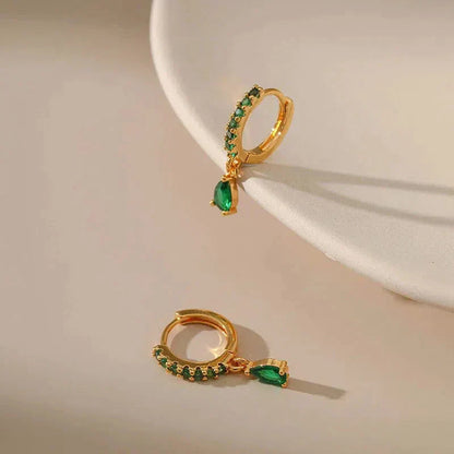 Gold earrings with emerald and zirconia. Jula Jewelry