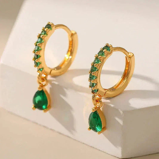 Gold earrings with emerald and zirconia. Jula Jewelry