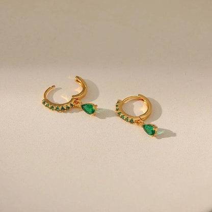 Gold earrings with emerald and zirconia. Jula Jewelry