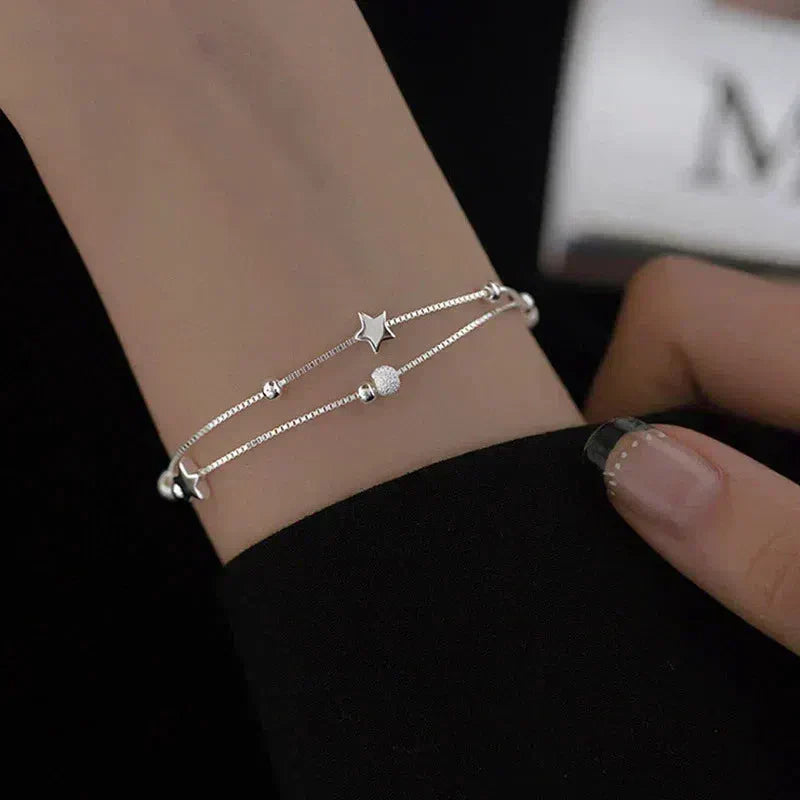 Silver bracelet adorned with stars Jula Jewelry