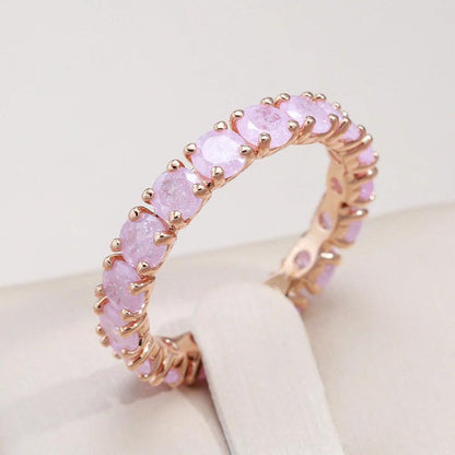 Gold ring with a round stone Jula Jewelry