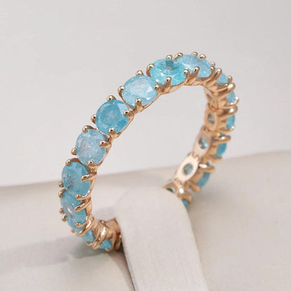 Gold ring with a round stone Jula Jewelry