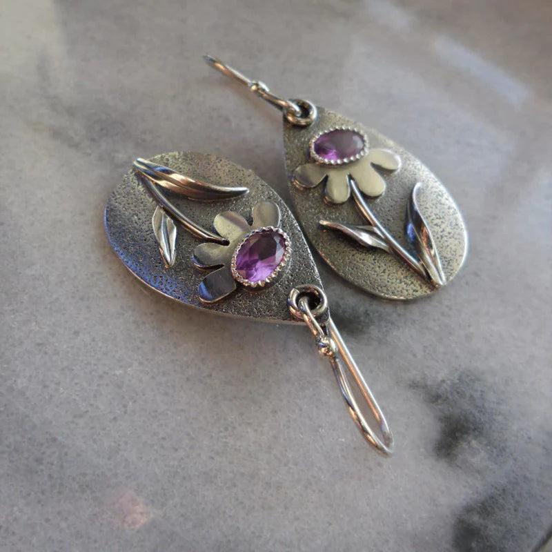 Vintage earrings featuring 3D floral designs Jula Jewelry