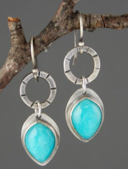 Vintage earrings featuring turquoise inlay Jula Jewelry