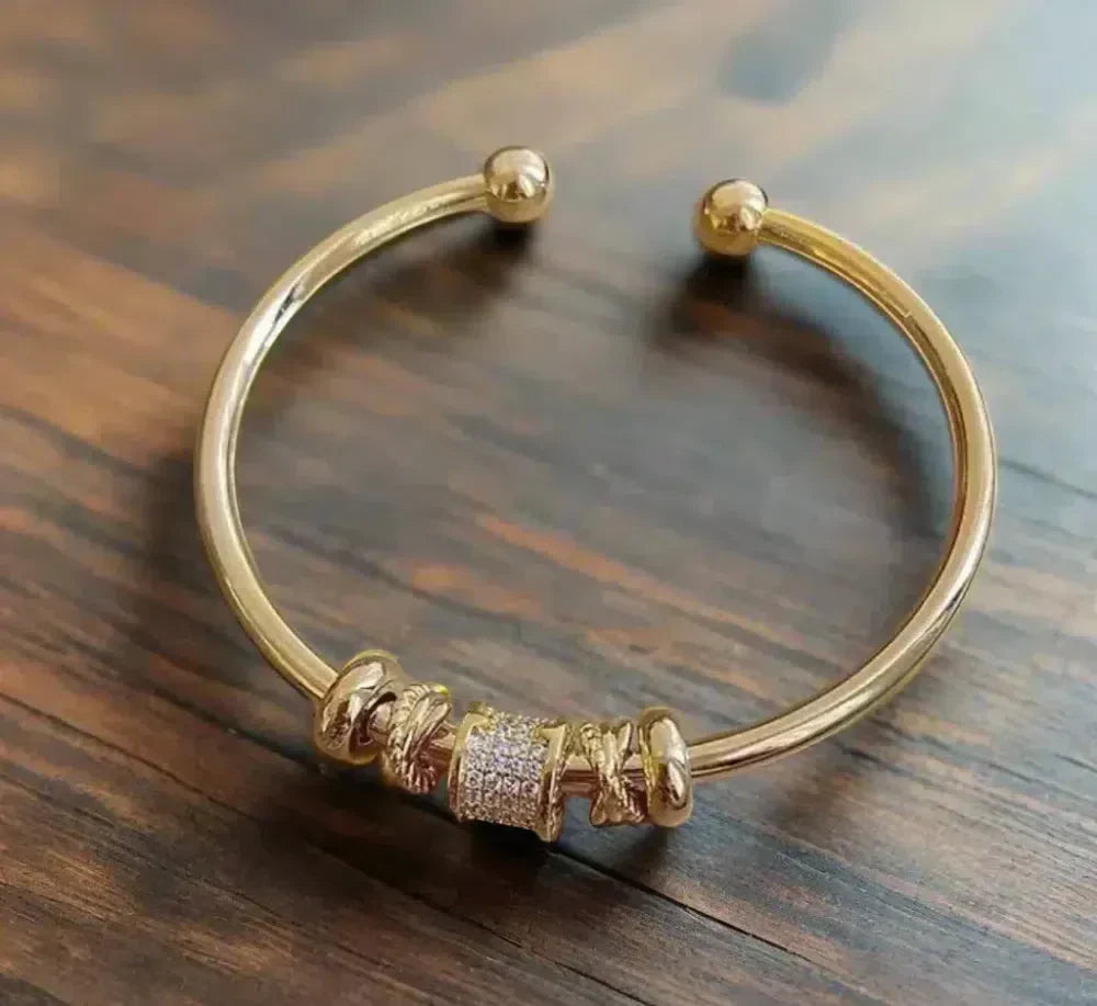Adjustable wristband with golden charms Jula Jewelry