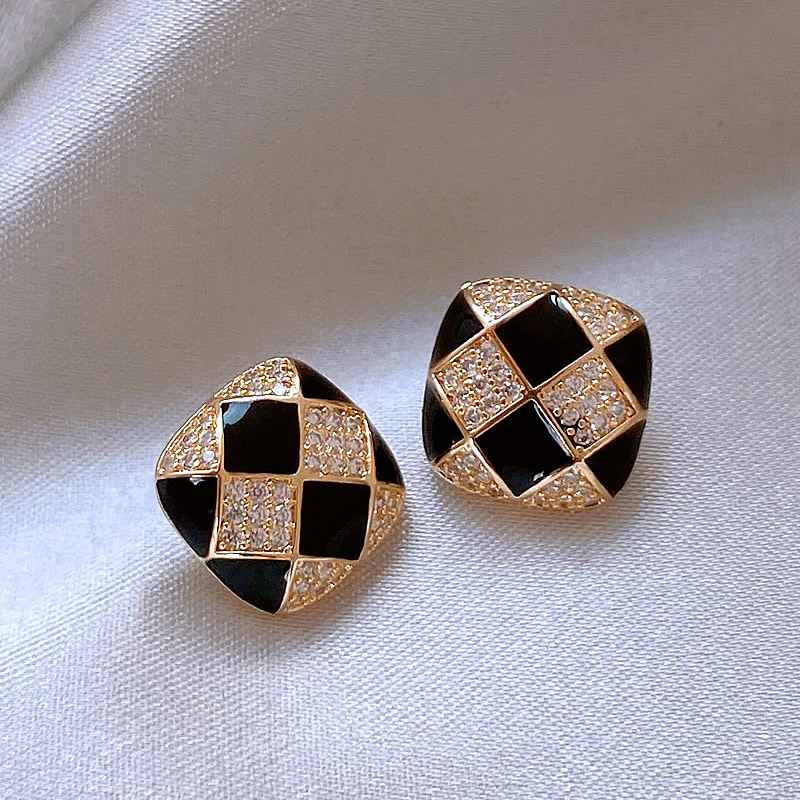 Elegant shiny earrings crafted from black enamel. Jula Jewelry