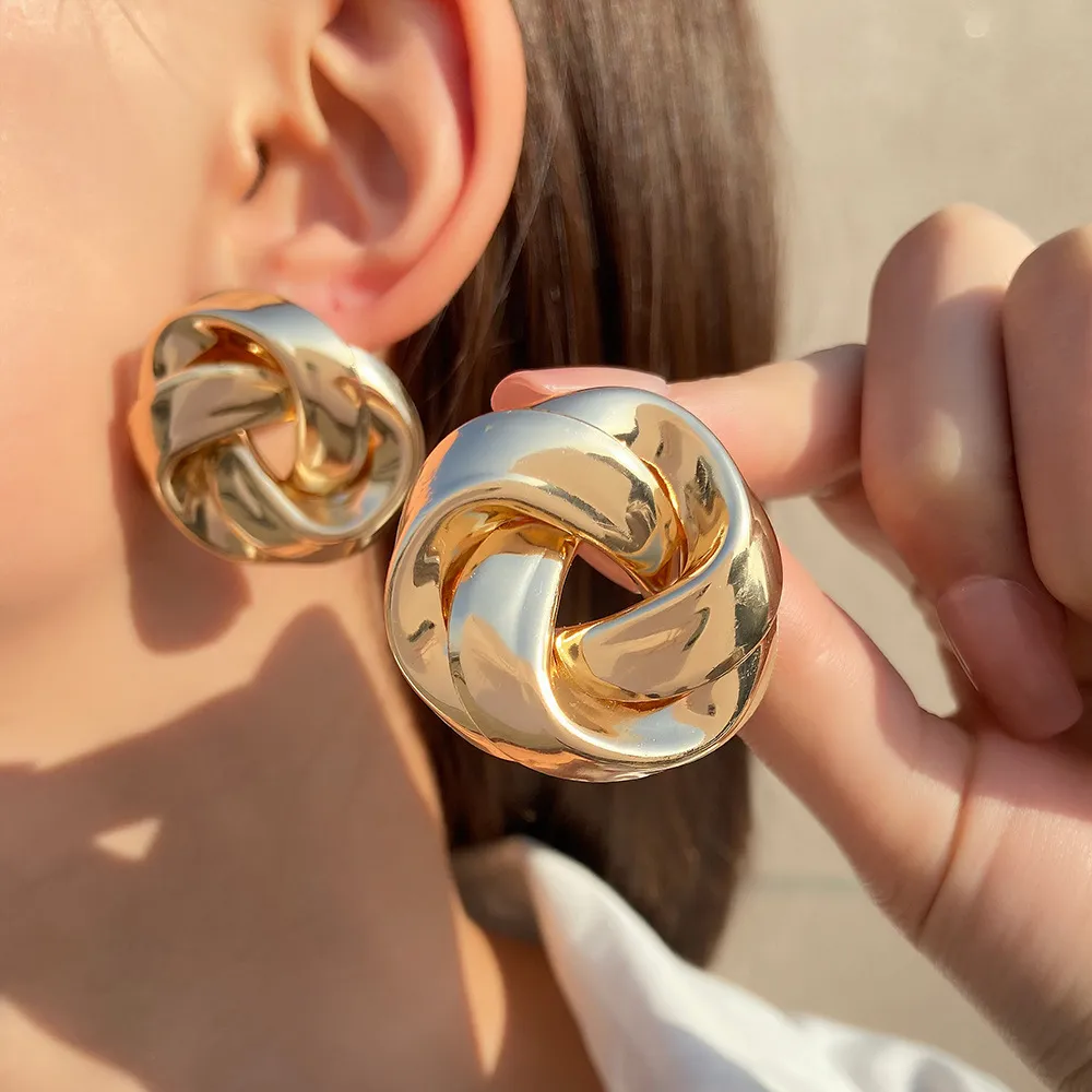 Elegant earrings with a golden ribbon bow Jula Jewelry