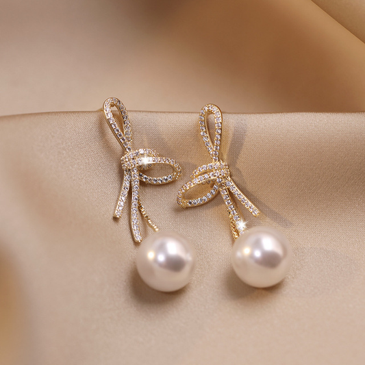 Gold Pearl Earrings with Glossy Bow Jula Jewelry