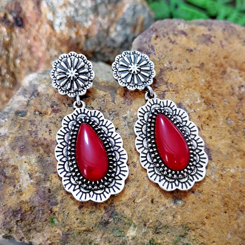 Vintage earrings featuring a crimson gem Jula Jewelry