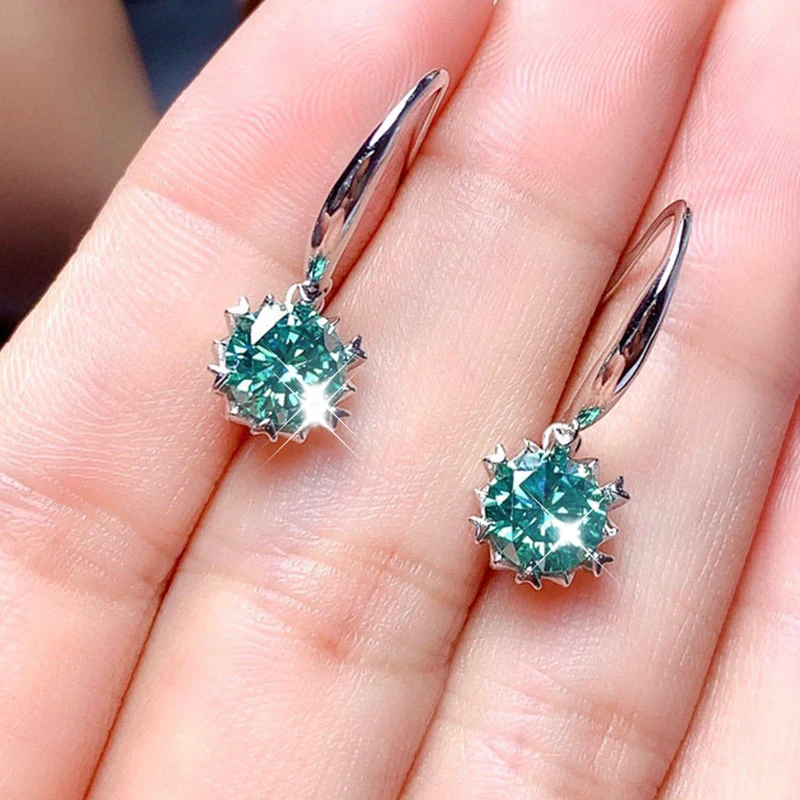 Elegant earrings crafted from turquoise and cubic zirconia. Jula Jewelry