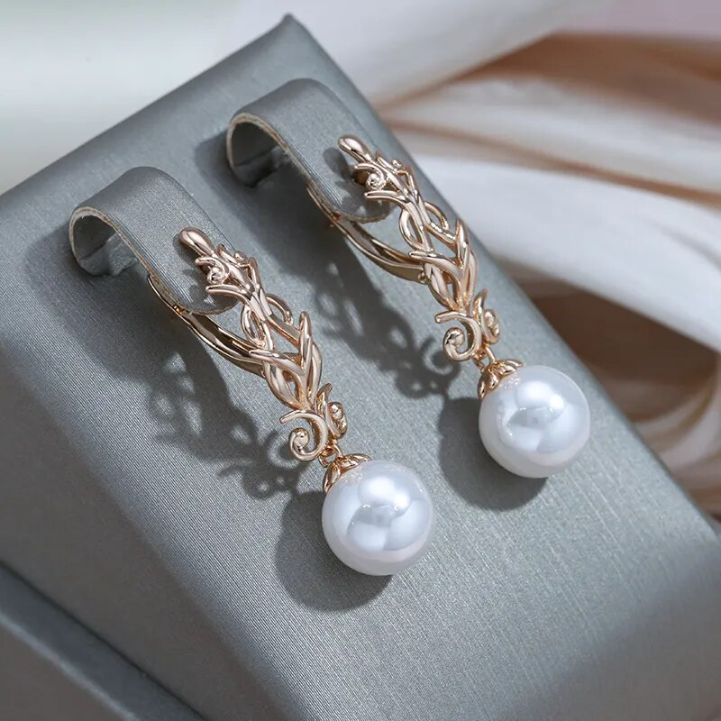 Elegant pearl earrings with a delicate drop design Jula Jewelry