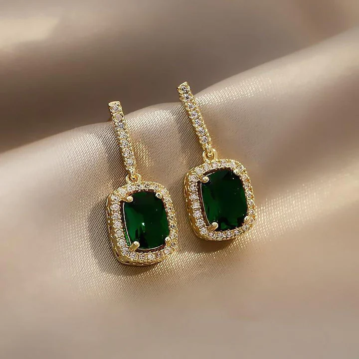 Elegant earrings adorned with shimmering green crystals Jula Jewelry