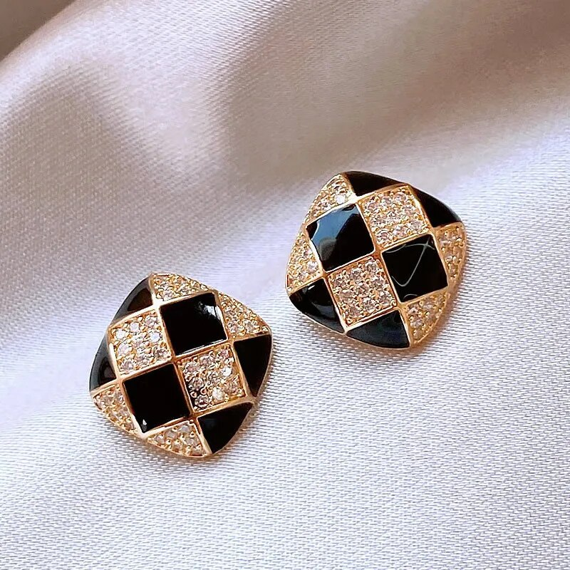 Elegant earrings crafted from lustrous black enamel Jula Jewelry
