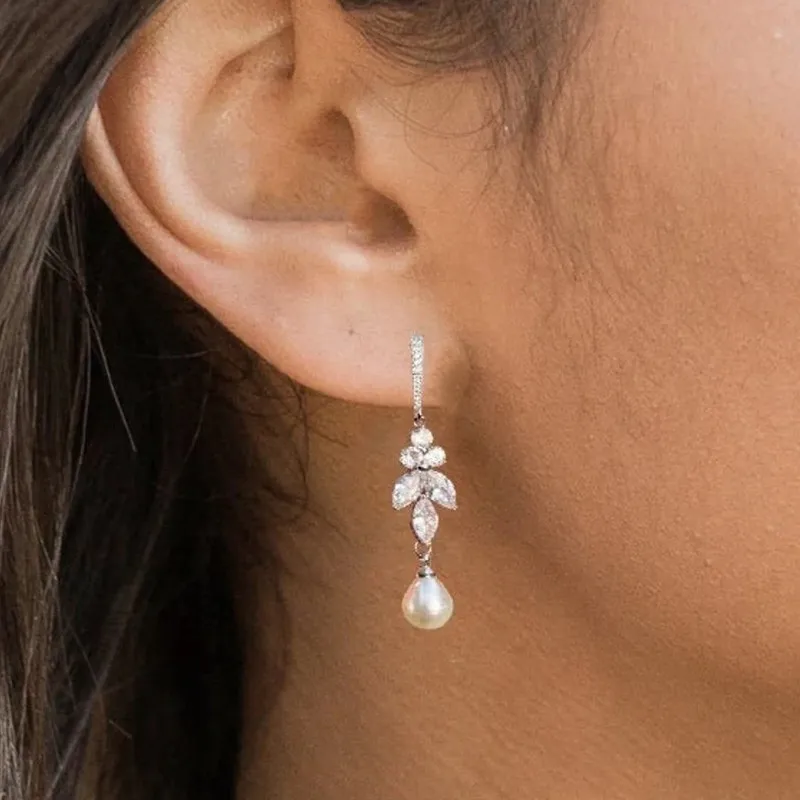 Earrings with dangling pearls on zirconia leaves Jula Jewelry