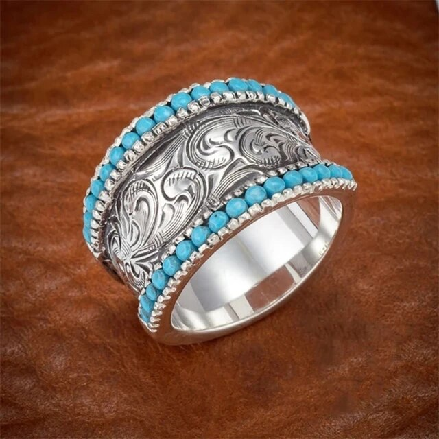 Vintage ring featuring turquoise gemstones Jula Jewelry