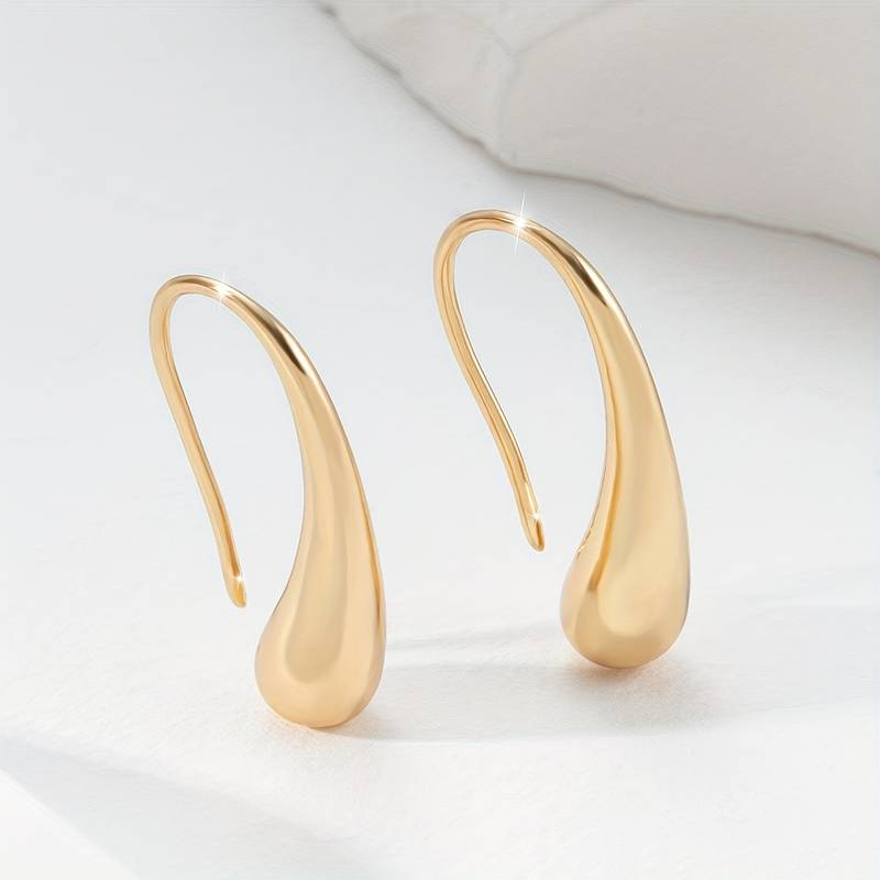 Certainly! Here's a slightly edited version:

Vintage Gold "Drop" Earrings Jula Jewelry