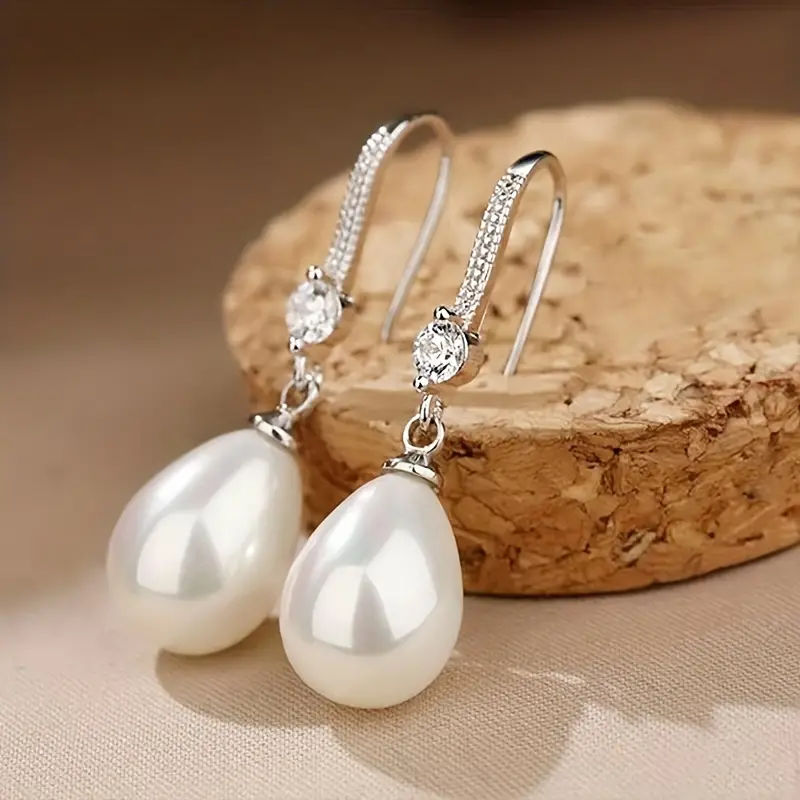 Shiny pearl earrings with lustrous gems Jula Jewelry