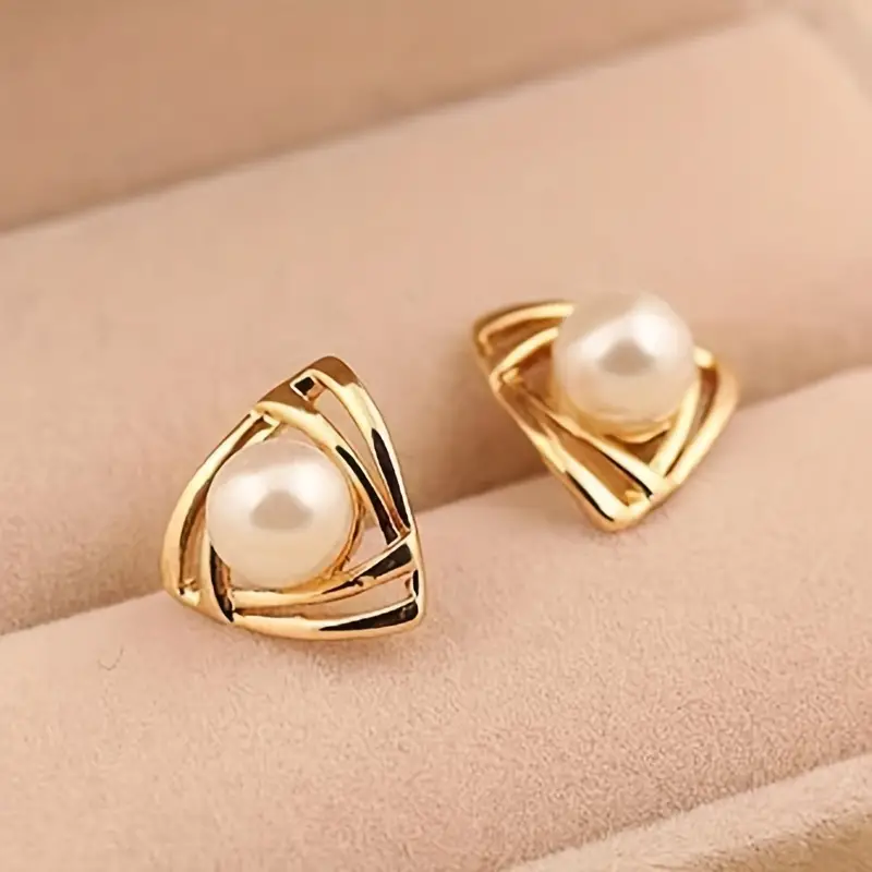 Elegant earrings crafted from pearls and gold Jula Jewelry