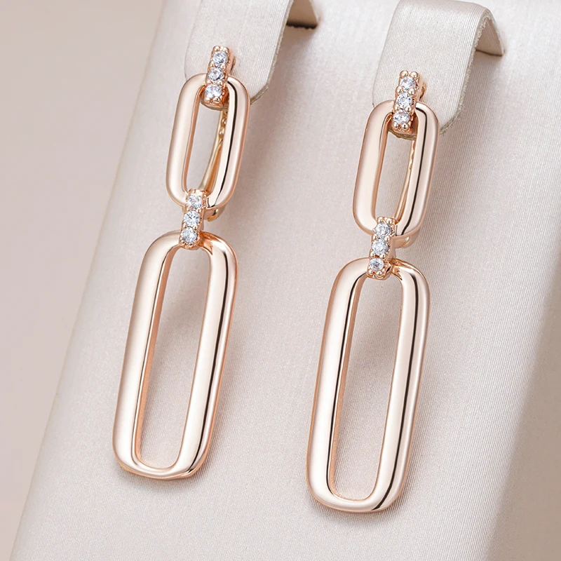Delicate dangling earrings crafted from gold Jula Jewelry