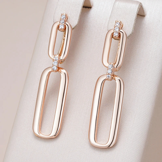 Delicate dangling earrings crafted from gold Jula Jewelry