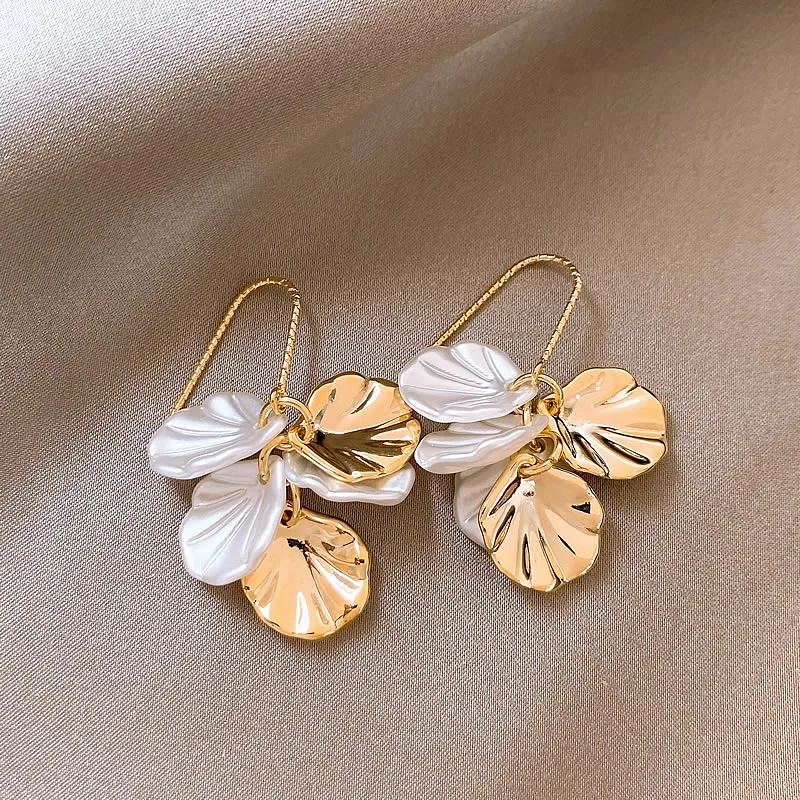 Elegant earrings crafted from white and gold petals Jula Jewelry