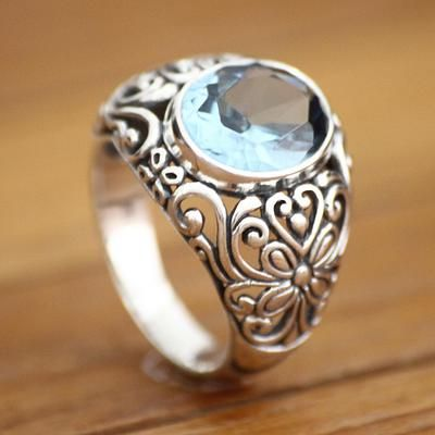 Vintage ring featuring a blue inset stone Jula Jewelry