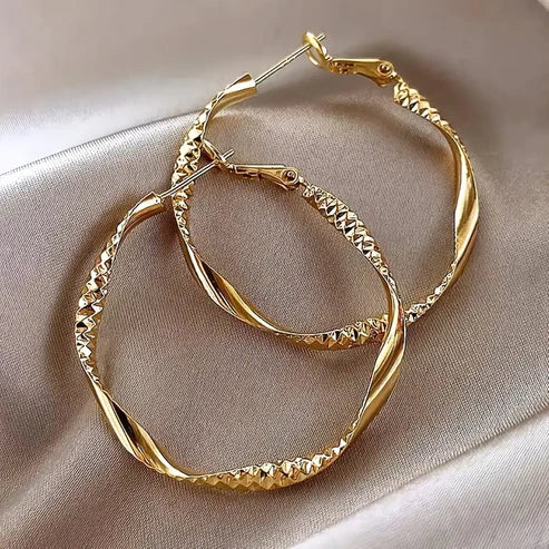 Radiant Circle Gold Earrings Jula Jewelry